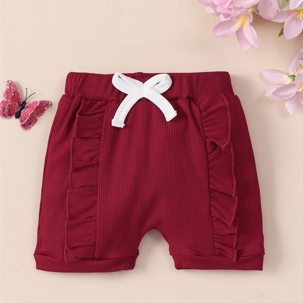 

baby knot front ruffle trim shorts she, Black