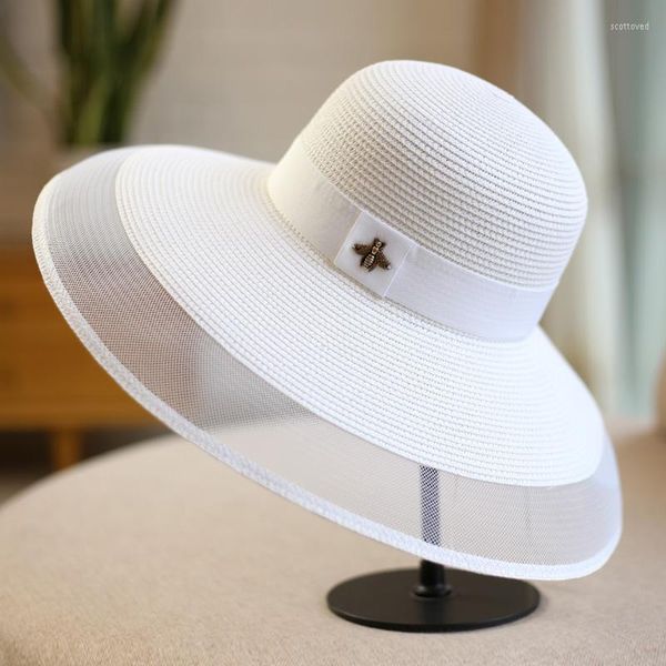 Cappelli a tesa larga Eleganza retrò Piccola fragranza Maglia a vento Spiaggia Blocco solare Grande cappello di paglia Moda Donna Pieghevole Designer di lusso Scot22