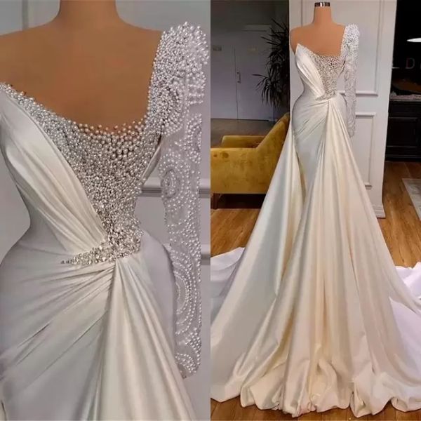 

2022 mermaid wedding dresses with overskirt bridal gown one shoulder long sleeves sweep train pearls beaded custom made beach vestido de nov, White