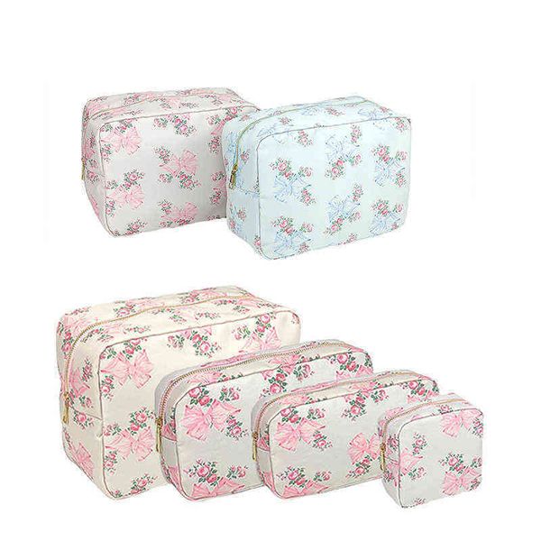 

cases 4 sizes makeup bag pink bule printed bow toiletry pouch waterproof women storage nylon travel organizer 220708
