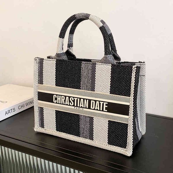 

new fashion canvas large capacity striped portable bag simple trend women's tote bag