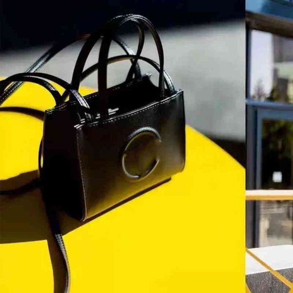 

factory direct sale onnuk same niche simple tf small women's single shoulder men's portable shopping msenger designer bag