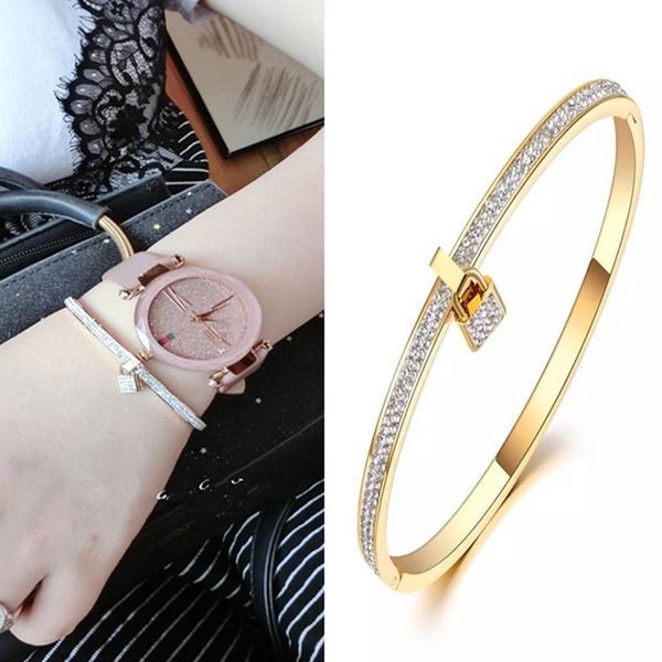 Bracciale rigido aperto in acciaio inossidabile dorato per donna Accessori per gioielli in cristallo con chiusura a mano Zirconia Gioielli di moda Coppia in titanio Designer di lusso