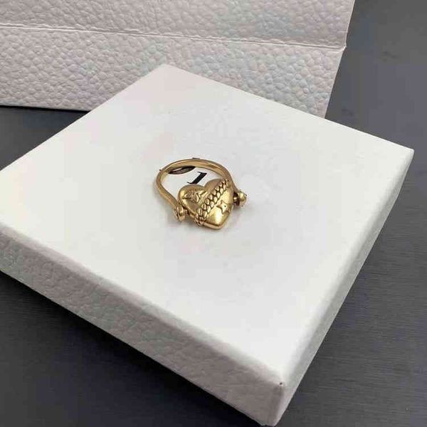 

factory wholesale letter heart-shaped rotatable ring fashion temperament simple brass ring, Silver