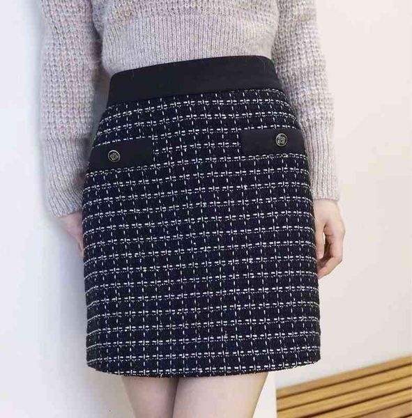 

skirts style in autumn and winter of , sweet little fragrance, plaid woven skirt, short skirt, Black