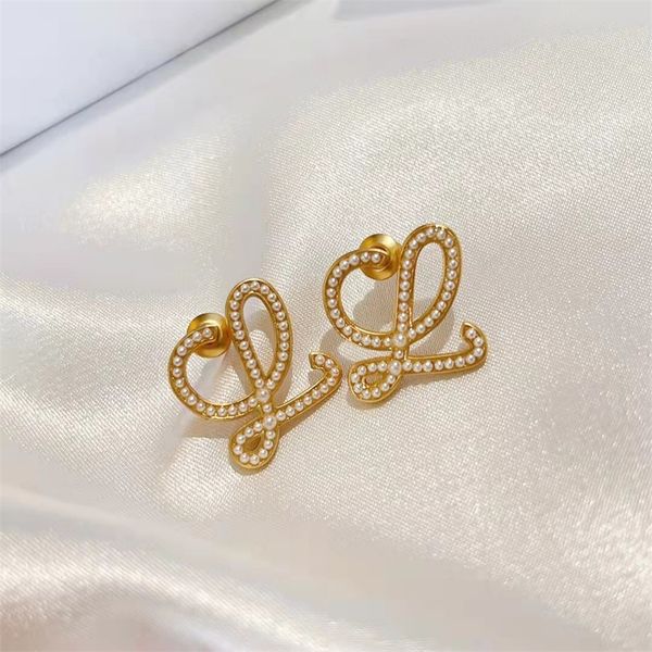 

fine rowe high version ruyi knot pearl earrings women's simple design hollow earrings, Golden