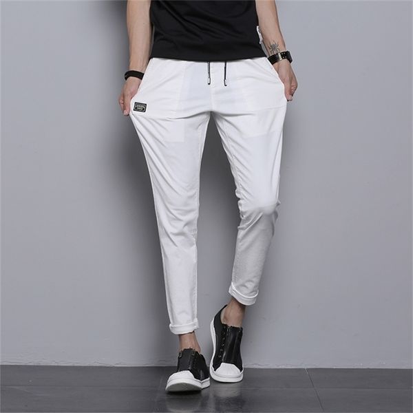 

korean men pants black white trousers male pantalon homme kpop clothing joggers slimming cotton solid stretch casual pants men 201128