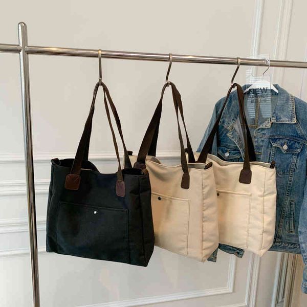 

bag female 2022 new student versatile large capacity canvas messenger ins fashion handbag purse outlet