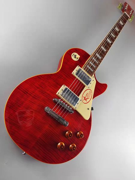 

lp electric guitar, mahogany body, rosewood fretboard, yellow binding