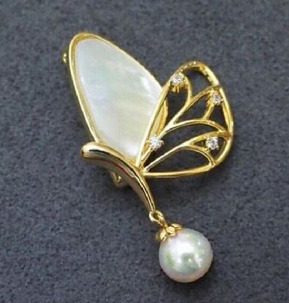 

cold wind ins half hollowed out shell butterfly brooch female breast button, Gray