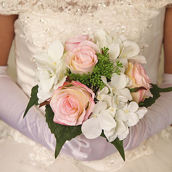 

simulation rose hydrangea bride bridesmaid holding bouquet wedding flowers living room table home vase flower arrangement