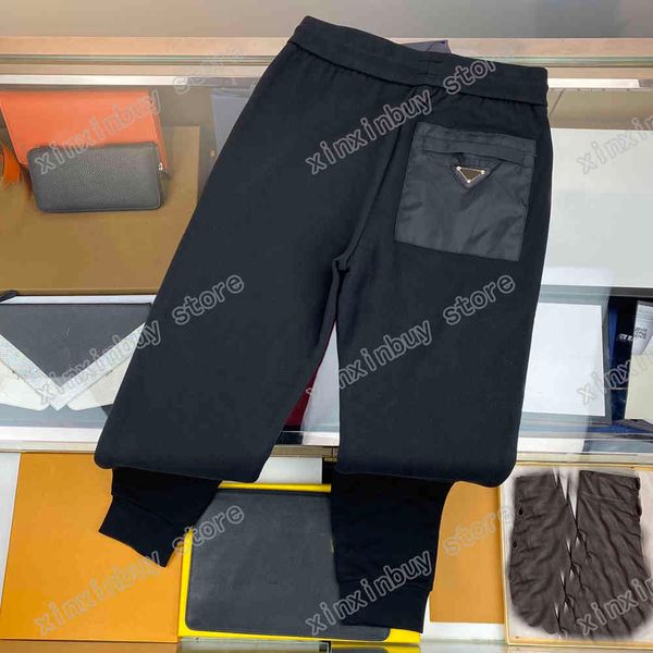 

2023 european autumn and winter latest fashion classic metal letter printing black trousers men's designer luxury neutral style jogger