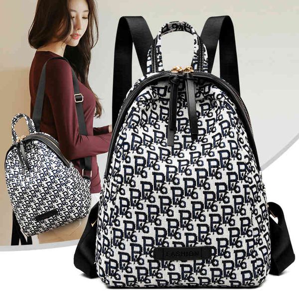 

backpack women's new printed backpack simple large capacity canvas schoolbag leisure bag