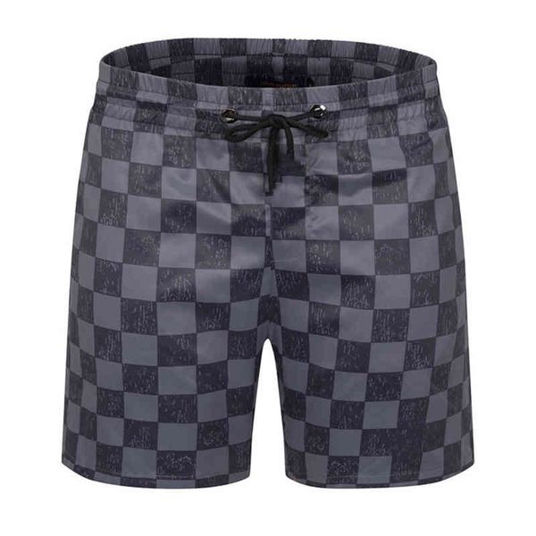 

mens summer digner shorts fashion loose swimming suits womens street wear clothing quick drying swimwear geometric printed board beach men, White;black