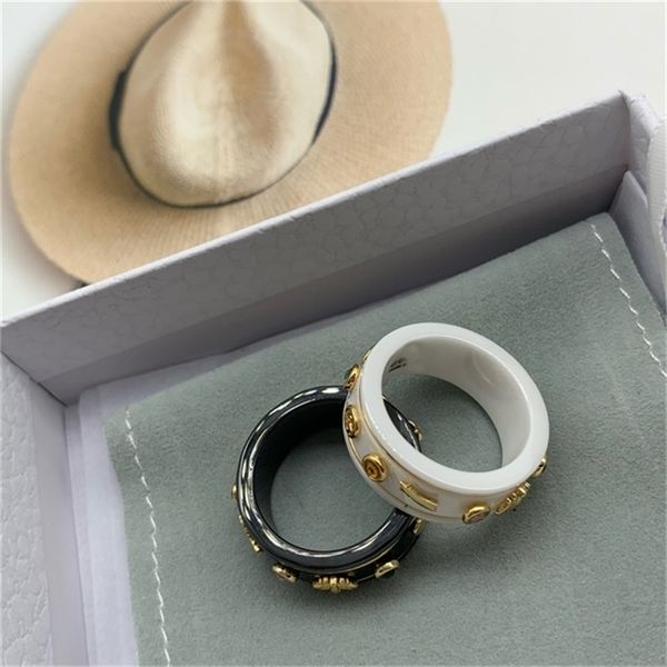 

2022 20% off designer jewelry gu g family fashion small black and white ceramic couple feminine temperament versatile star little bee ring f, Golden