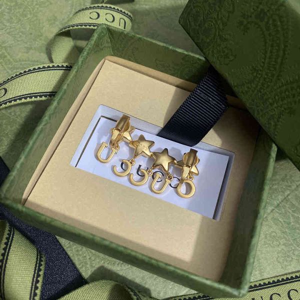 

2022 factory wholesale new ancient style five pointed star inlaid crystal letters unilateral gold earrings versatile ear clip women, Golden