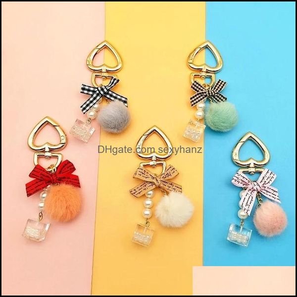 

key rings jewelry fashion pearl chain crystal bottle bow pompom keychain for women handbag ring car fluffy puff ball keychains drop delivery, Slivery;golden