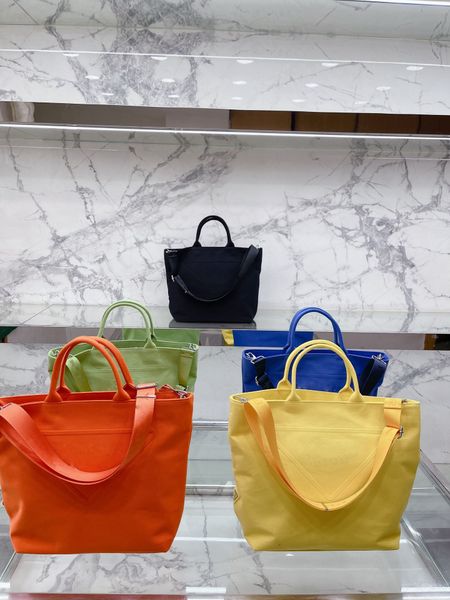 

shopping bags large capacity designer solid color fashion metal triangle tote bag