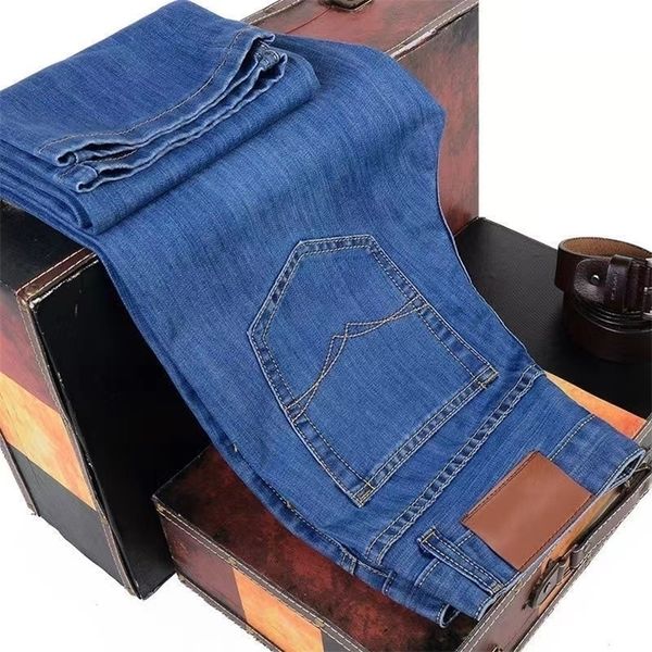 

classic style summer autumn black blue mens business jean fashion casual denim stretch outsize pants brand trousers w220813