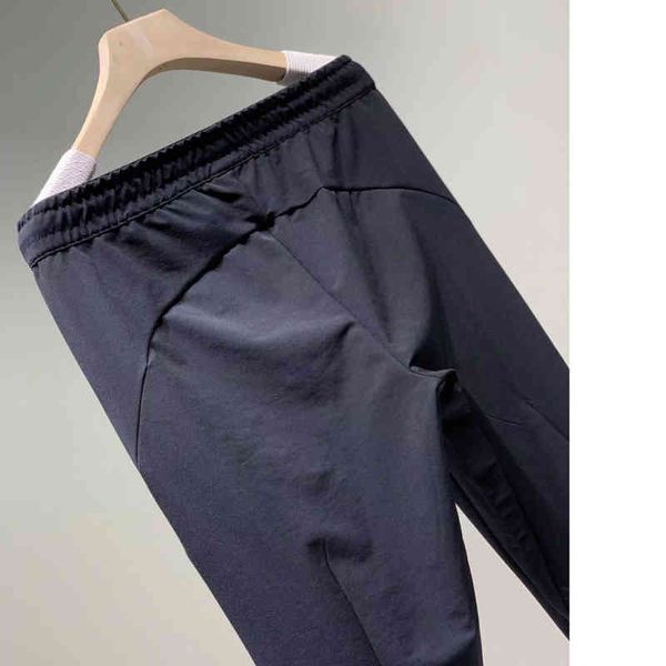 

design new men's classic small sports leisure versatile woven casual pants, White;black