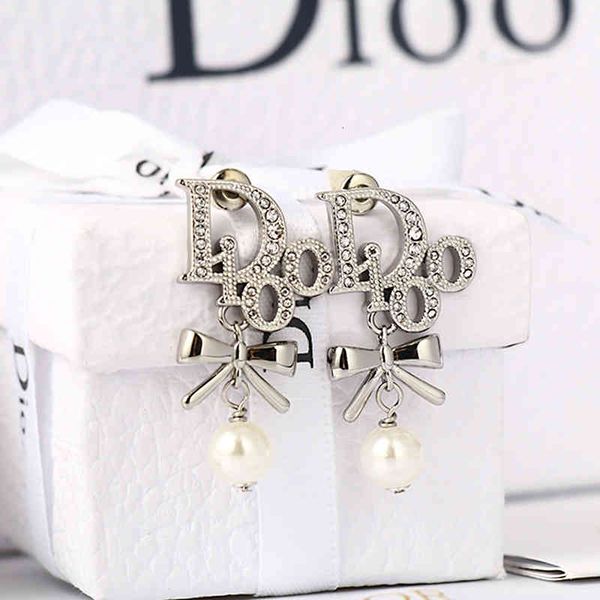 

earrings golden pearl bow net female fashion