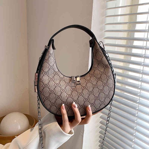 

fashion bag 70% off factory store online moon female summer 2022 new french minority hand sense ins printed messenger bag