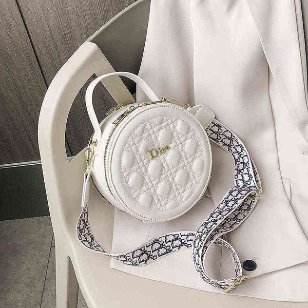 

factory direct sale 2022 urban new one shoulder portable fashion texture messenger women's round cake bag net red trend