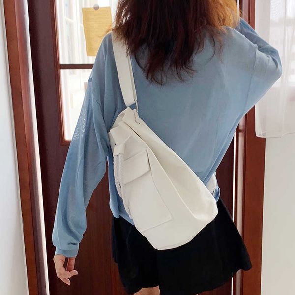 

korean ins with autumn 2022 pocket canvas drawstring bucket bag inclined span student one shoulder high-capacity backpack