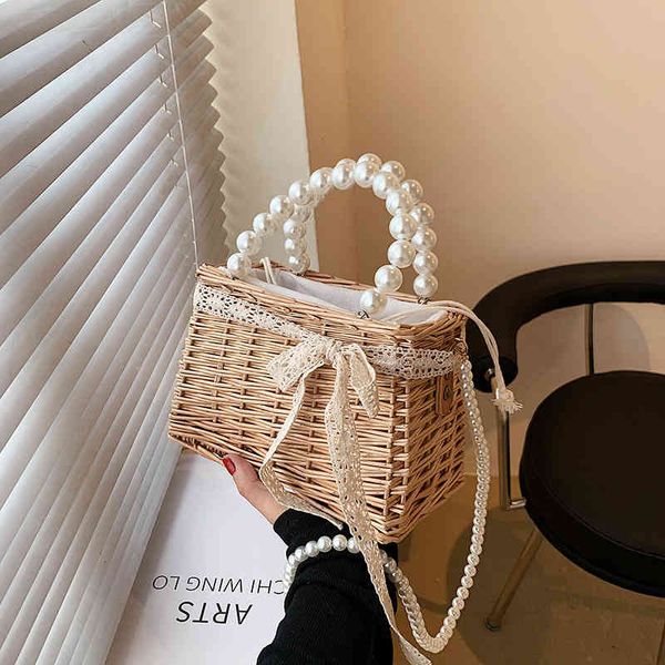 

ladies fashion personality trend new brand bag wholesale summer woven handbag small rattan pearl chain hollow silk scarf hand single shoulde