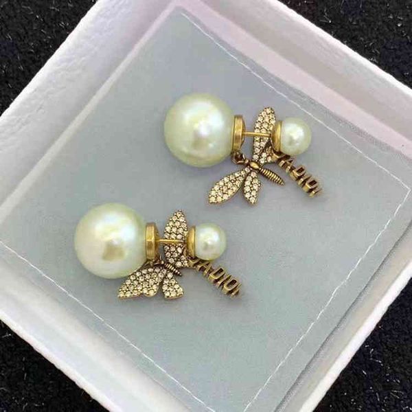 

2022 factory wholesale new di home butterfly dragonfly asymmetric pearl female earrings 925 silver needle jewelry qs4j, Golden