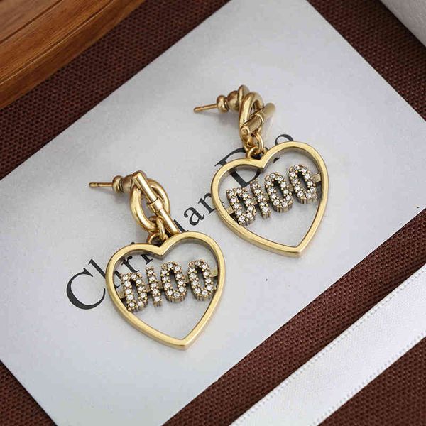 

2022 factory wholesale new earrings dijia net red female creative peach heart earrings, Golden