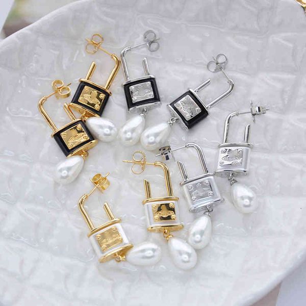 

western empress dowager's same pearl resin lock earrings personalized female, Golden;silver