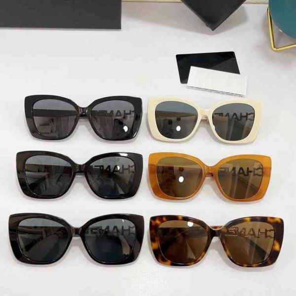 

2022 brand trend fashion sunglasses for men and women women's red personality cat's double diamond inlaid letter mirror leg sungla, White;black