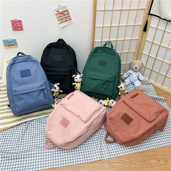 

fashion large capacity women backpack nylon waterproof solid school bag for girls trendy pendant student large scoolbags unisex