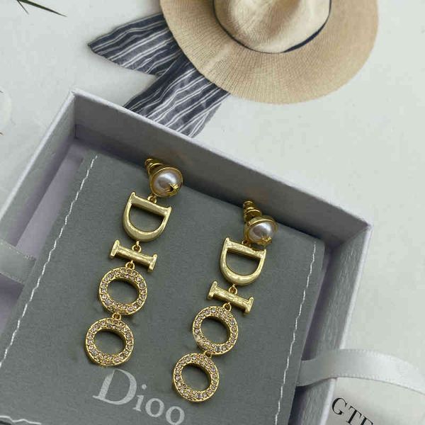 

2022 factory wholesale new dijia pearl women's net red same high sense earrings, Golden