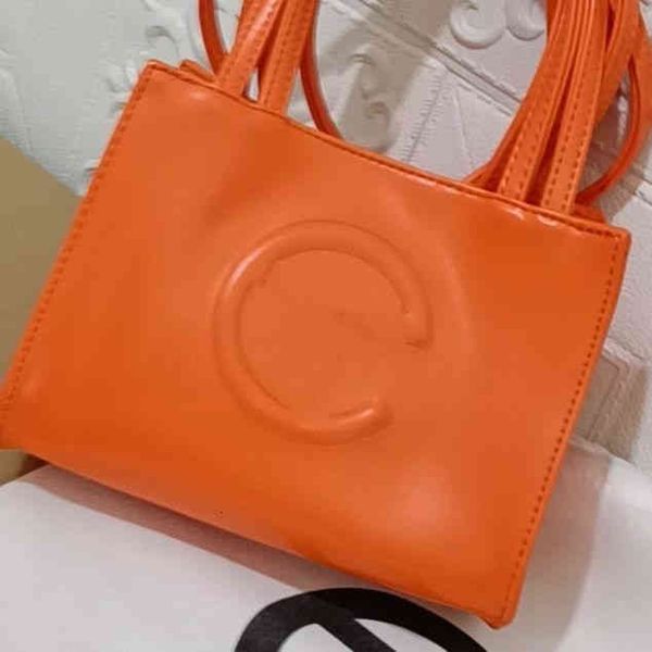 

factory direct sale real p of onnuk same niche simple tf small women's shoulder men's portable shopping msenger bag designer