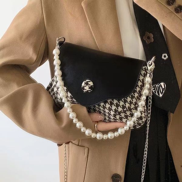 

fashion shoulder or slung crossbody bag bead handle and chain across the arm women handbag