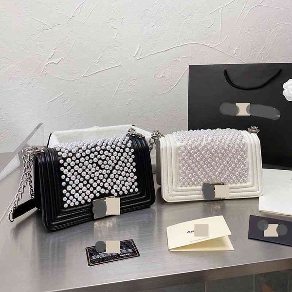 

spicy xiangjia women's leather small fragrance mother's pearl big brand luxury 2021 new fashion spring and summer messenger