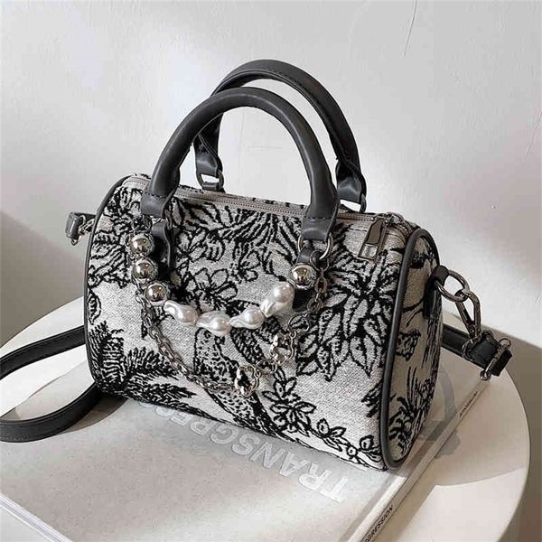 

small women's fashion portable cylinder messenger pillow purses outlet online 06