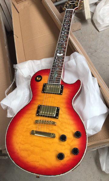 

6 string electric guitar quilted maple golden hardware