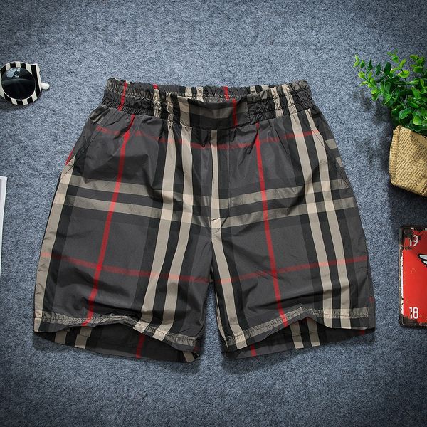 

men's shorts designer summer leisure quick drying three-part beach shorts men's home slim pants large trouser head and sports plai, White;black