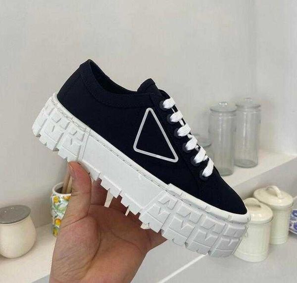 

luxury women sneakers designer shoes lnspired by motorcycle wheels a nylon gabardine sneaker has thick rubber sole ariangular adorns, Black