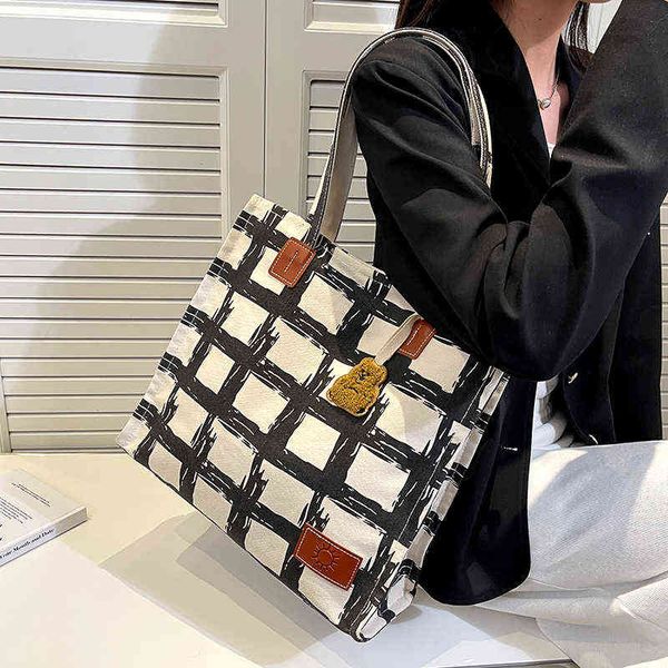 

shopping bags veryme luxury women's bag trend tote bag large capacity canvas travel shopping ladies plaid bear pendant shoulder handbag