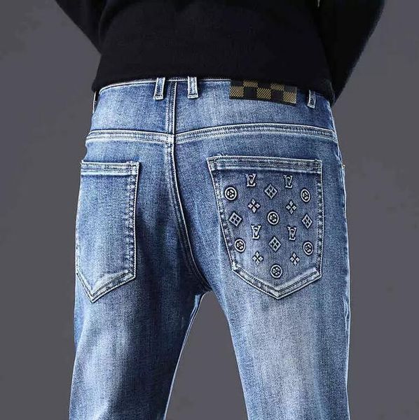 

men's jeans designer autumn and winter men's pants light blue korean slim fit feet elastic printed vxei