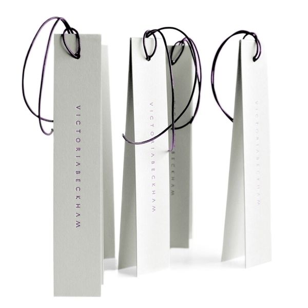 

luxury die cut paper swing hang tag custom fashion stamping logo new design tag