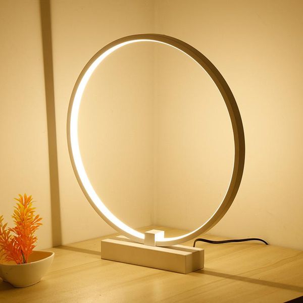 Lâmpadas de mesa nórdica simples sala de estar criativa LED LEITO ESTUDO DE CABEÇA O escritório anel circular lâmpada de decoração diminuído