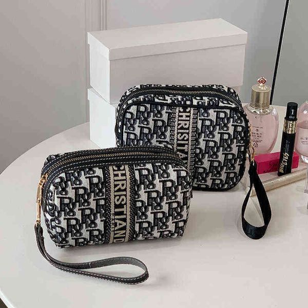 

factory direct sale cosmetic portable go out carry on storage wash large capacity simple advanced feeling hand bag