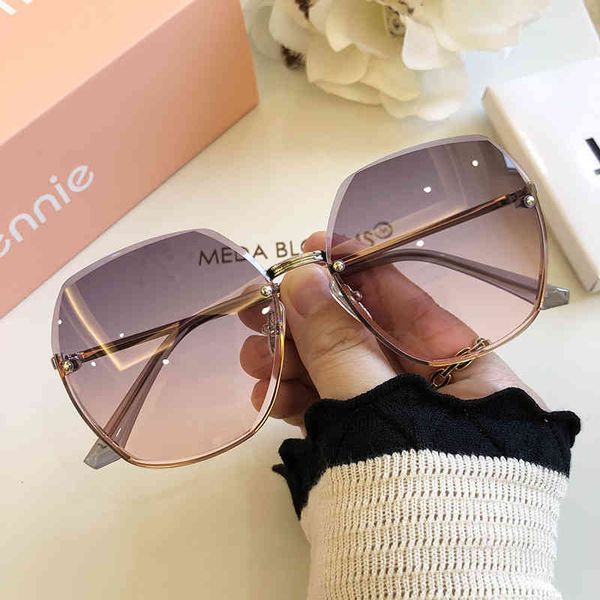 

sunglasses 2022 frameless nylon lens women's fashion glasses personalized large frame round face, White;black