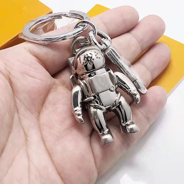 

ashion new stainless steel spaceman key ring luxury designer keychain self defense coin purse keychain pendant accessories, Slivery;golden