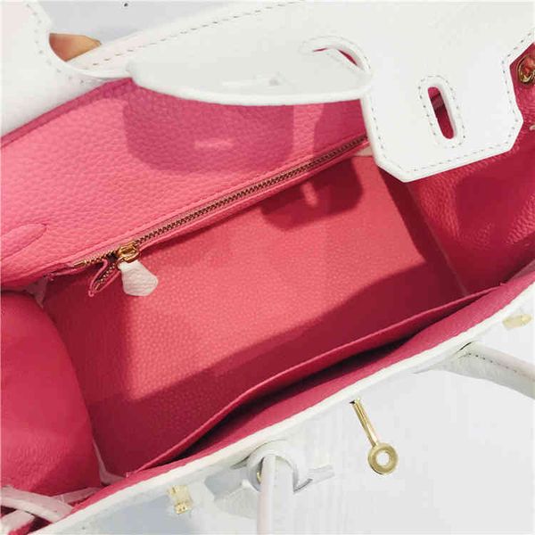 

handbags classic bikinis fashion handbags fashion shoulder herme head leather contrast bag with pink color inside and outside